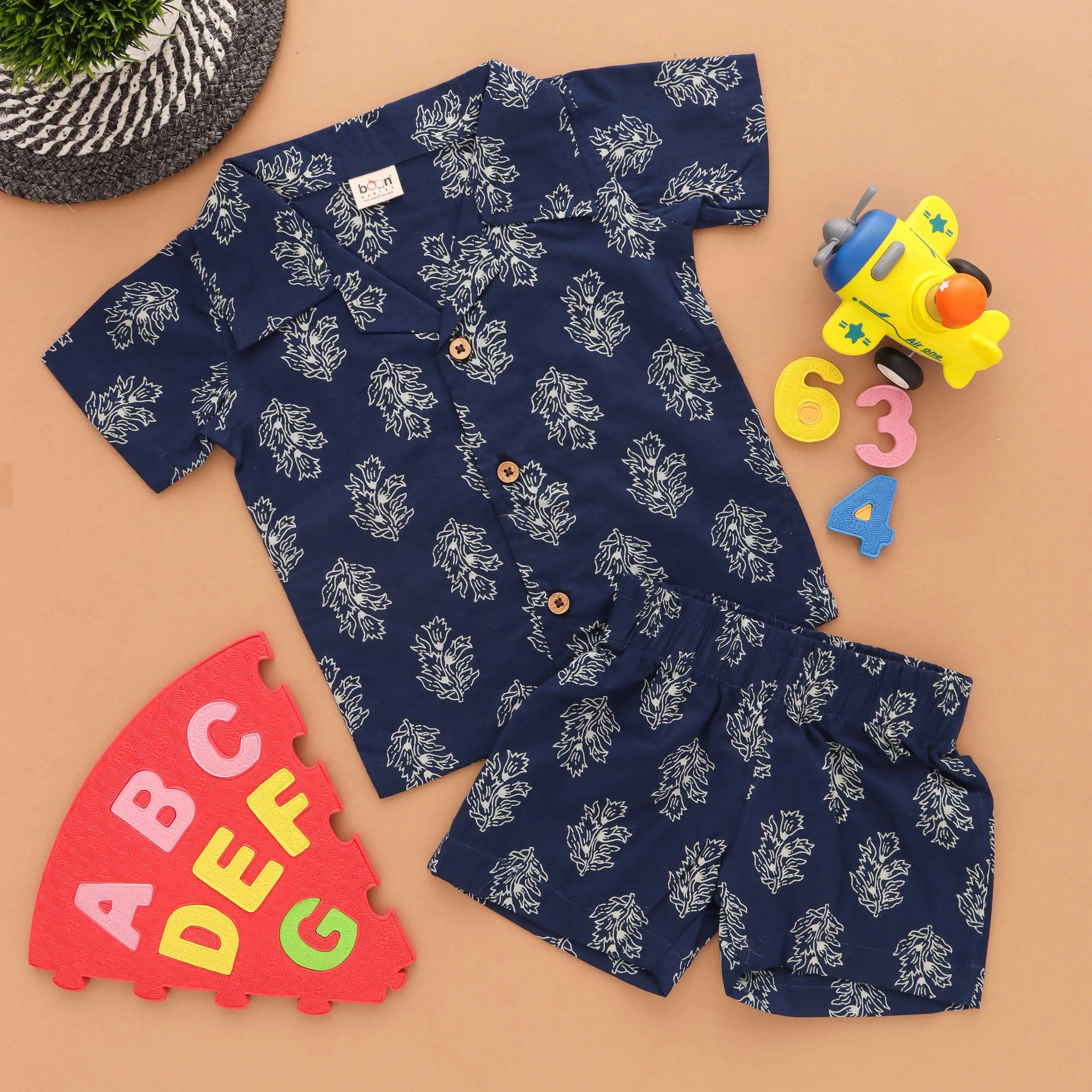 Floral Fiesta: Trendy Boys' Shirt and Shorts with Flower Prints